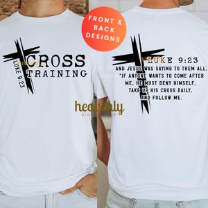 May include: White t-shirt with a black cross design and the words "CROSS TRAINING" on the front. The back of the shirt features a cross design and a Bible verse from Luke 9:23. The shirt has a crew neck.
