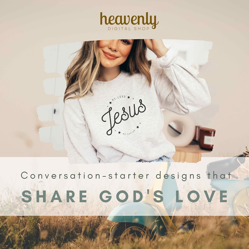 May include: A woman wearing a gray sweatshirt with the text "MY LORD - Jesus - MY SAVIOR" in a circle. The text is in a black cursive font. The woman is sitting on a blue scooter in a field of tall grass. The text "Conversation-starter designs that SHARE GOD'S LOVE" is at the bottom of the image.