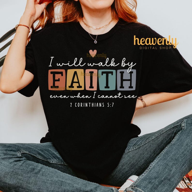May include: Black t-shirt with the text "I will walk by FAITH even when I cannot see 2 Corinthians 5:7" in colorful block letters.