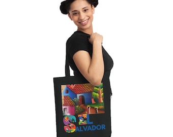 May include: A black tote bag with a colorful illustration of a house and the words "EL SALVADOR" in blue letters.