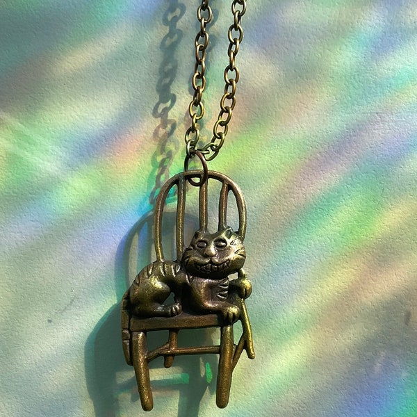 Collier pendentif chat du Cheshire