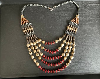 Tribal style beaded ethnic necklace. Red, black, brown wooden beads.