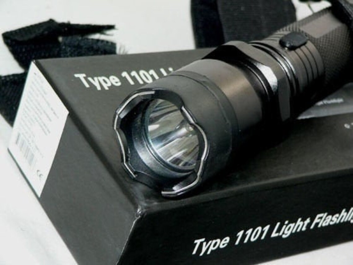 Flashlight with electric shock for emergency services and Etsy