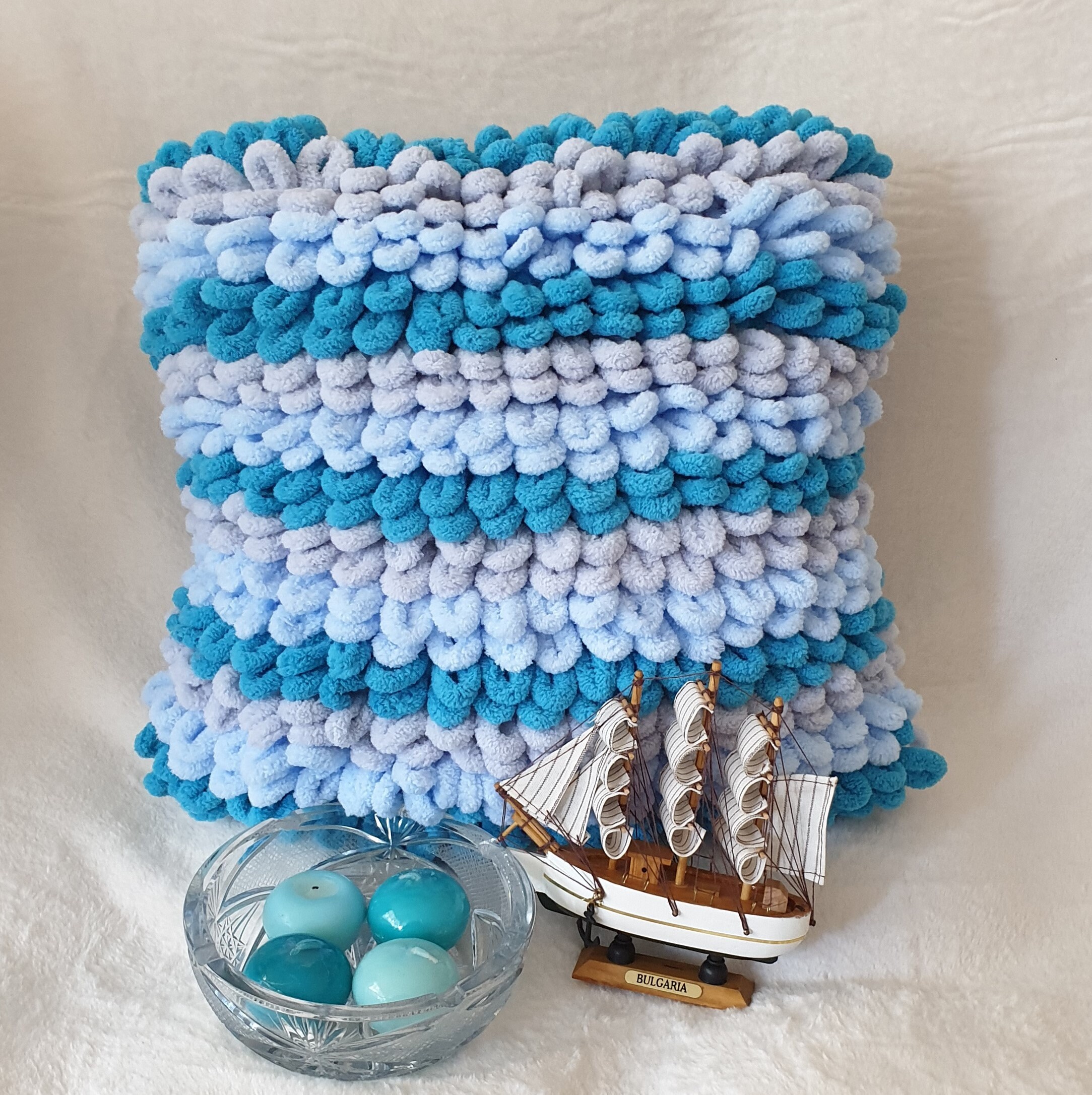Handmade knitted cozy, fluffy pillow in a blue shades.Summer house Bohemian cushion.Cute bedroom or nursery decor.Baby warmth hugging pillow