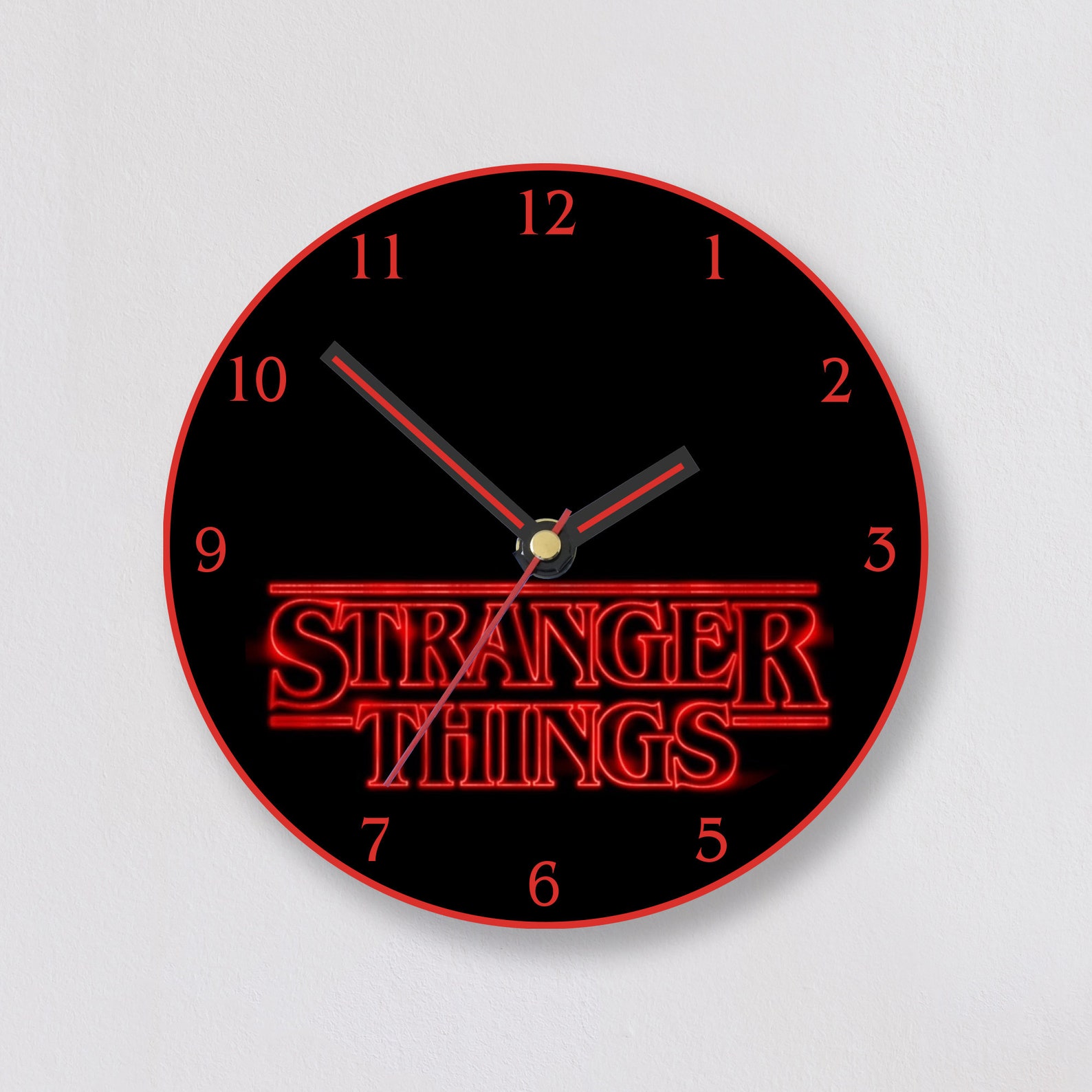 Stranger Things Wall Clock with desk stand comes in Etsy
