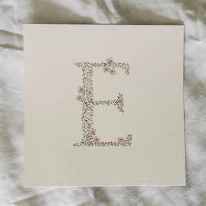Pintura em aquarela floral com letras personalizadas