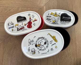 Lancheira Snoopy de três estágios da turma do Snoopy, fabricada no Japão.
