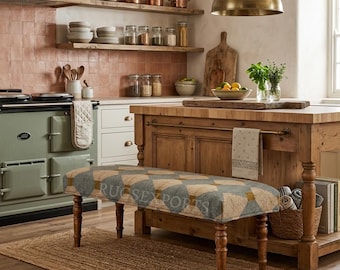 May include: A rectangular upholstered bench with a gray and tan geometric diamond pattern, featuring four turned wooden legs. The bench is positioned in a kitchen in front of a wooden island, with the text RUGSEXPORTS visible on the seat fabric.
