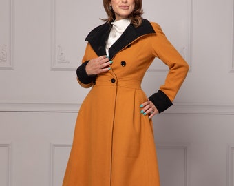 May include: A long, orange coat with a black collar and cuffs. The coat has a double-breasted closure and a fitted waist.