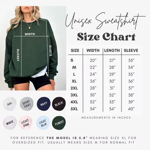 May include: Unisex sweatshirt size chart with measurements in inches for sizes S through 5XL. The chart shows width, length, and sleeve length for each size. The chart is on a white background with a green sweatshirt and color swatches for different colors.