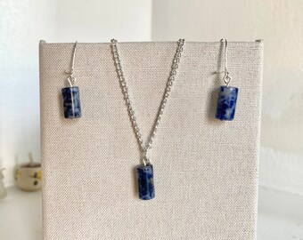 Matching blue mottled cylindrical necklace and earrings jewellery set