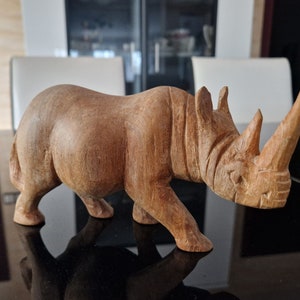 Rare vintage rhinoceros hand carved ironwood sculpture Hardwood sculpture, wooden sculpture of a rhinoceros, made of one piece of wood