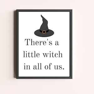 May include: A black and white printable art print with a witch's hat and the text "There's a little witch in all of us."