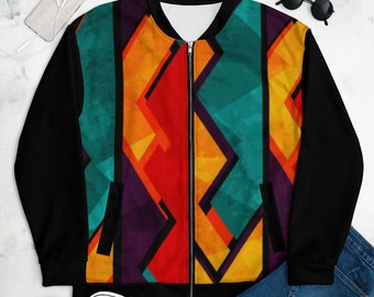 May include: A black bomber jacket with a colourful geometric pattern. The pattern features shades of red, orange, yellow, green, and purple.