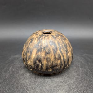 May include: A handmade wooden sign with the text "Welcome" in a playful font. The sign is painted white with a distressed finish, and features a decorative floral design in shades of pink and green. It is designed for indoor or outdoor use.