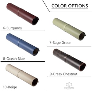 May include: A close-up of rolled-up leather mouse pads in various colors, including burgundy, sage green, ocean blue, crazy chestnut, and beige. The image shows the color options available for the mouse pads.