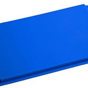 May include: A bright blue silicone baking sheet with a raised edge. The sheet is rectangular with rounded corners.
