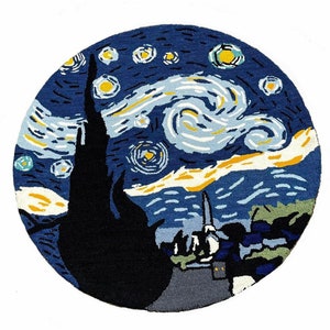 May include: A round rug with a blue background and a swirling white and yellow design. The design is reminiscent of Vincent van Gogh's "Starry Night" painting.
