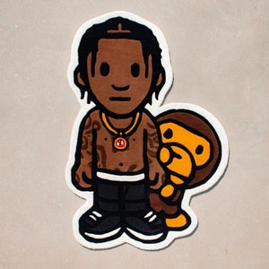 May include: A brown and black cartoon rug featuring a person with a gold chain and a brown monkey. The person is wearing a black shirt and black pants. The monkey is wearing a yellow shirt.
