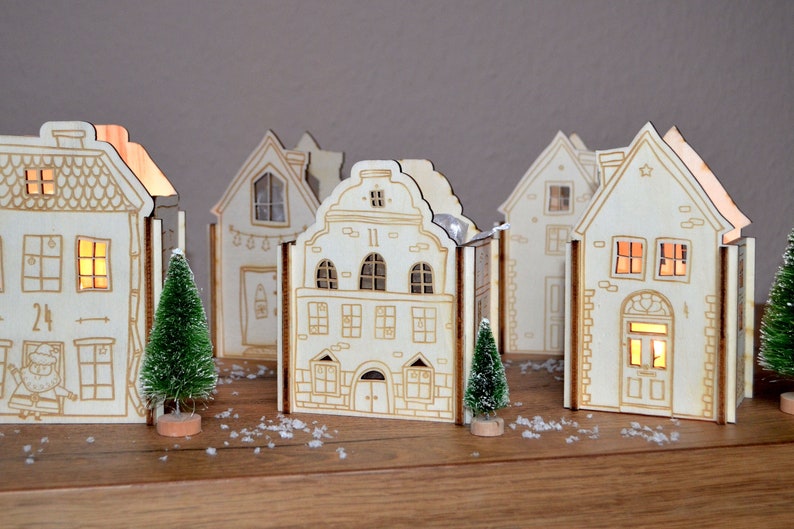 Adventskalender aus Holz aus 24 Holzhäusern zum Befüllen Adventskalender Weihnachtsdorf Bild 1
