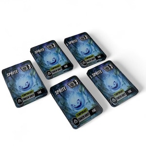 May include: Five rectangular game cards with a fantasy theme. Each card features a blue and white glowing sprite with the text "SPRITE" and "3". Additional text includes "TEMPORARY", "TOKEN UNIT", and "FAE".