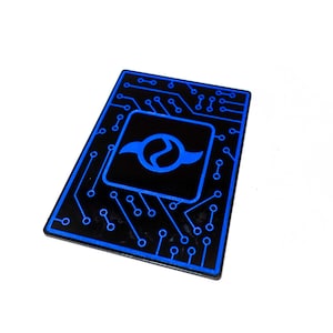 May include: A black rectangular card with a blue circuit board design and a blue symbol in the center. The card has rounded corners and is set against a white background. The symbol is a stylized yin-yang.