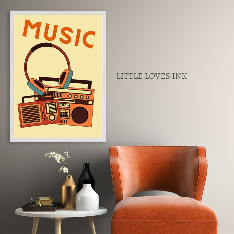 May include: A framed print with a yellow background featuring the word "MUSIC" in orange letters. A vintage-style boombox and headphones are depicted in the image. The text "LITTLE LOVES INK" is visible in the upper right corner.