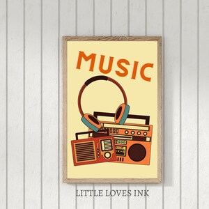May include: A yellow poster with the word "MUSIC" in orange letters. A vintage boombox with headphones is pictured below the text. The poster has a brown wood frame and the text "LITTLE LOVES INK" is printed below the frame.