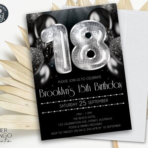May include: Black and silver 18th birthday invitation with a disco ball-style number 18. The invitation includes the text "Brooklyn's 18th Birthday" and event details. The design features black balloons and a white envelope.