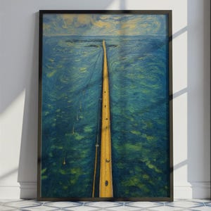 May include: A framed art print depicting a long yellow pier extending into a blue ocean. The artwork has a textured, painterly style with swirling water and a cloudy sky. The frame is black.
