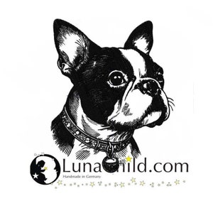 May include: Black and white illustration of a French Bulldog wearing a studded collar with a star charm. The text "Luna child.com" is below the dog, with the words "Handmade in Germany" underneath.