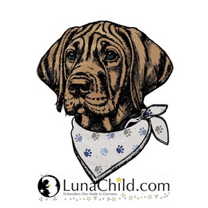 May include: An embroidered illustration of a brown dog with dark ears and blue eyes, wearing a white bandana patterned with small blue and gray paw prints. Below the dog is the text LunaChild.com and the phrase Embroidery files Made in Germany.