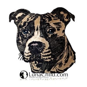 May include: An embroidered portrait of a dog with black and tan fur, featuring bright blue eyes and a black nose. Below the dog, the text reads LunaChild.com with the subtitle Embroidery files Made in Germany and a small circular logo icon.