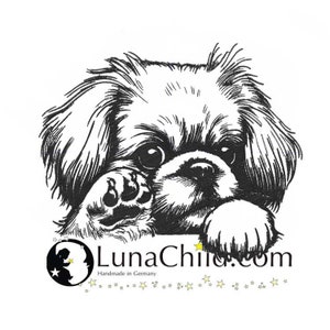 May include: Black and white line drawing of a Pekingese dog with its paw raised. The dog is looking at the viewer. The image includes the text "LunaChild.com" and "Handmade in Germany".
