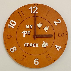 Beautiful contemporary housewarming battery wall clock with lovely nature theme design