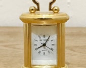 Beautiful sweet miniature brass Quartz oval carriage clock