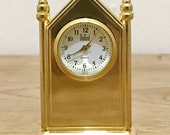 Wonderful sweet little Quartz desk clock with a gothic cathedral design
