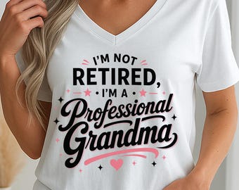 May include: A white short-sleeved V-neck t-shirt featuring the black and pink text I'M NOT RETIRED, I'M A Professional Grandma, accented with small pink stars, sparkles, and a heart graphic centered on the front of the garment.