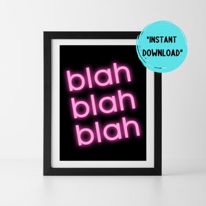 May include: A framed art print with the word "blah" repeated three times in a pink neon font against a black background. The print is in a black frame and has a turquoise circle with the text "*INSTANT DOWNLOAD*".