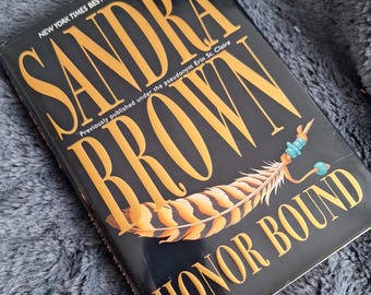ANVÄND "Honor Bound" av Sandra Brown