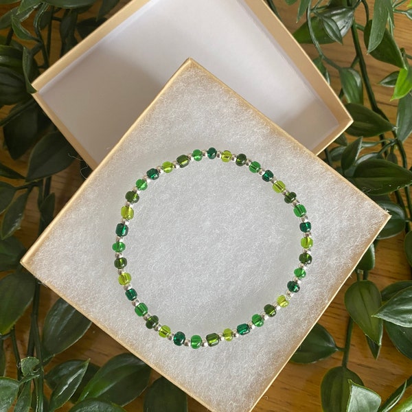 Greens and Silver coloured beaded stretch bracelet