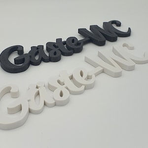 Door sign guest toilet including transparent double-sided adhesive dots