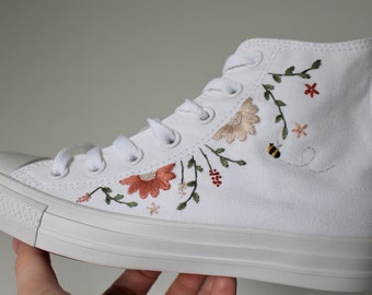 Embroidered Converse high tops