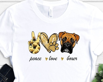 May include: White t-shirt with a peace sign, heart, paw print, and boxer dog graphic. The text "peace love boxer" is printed below the graphic.