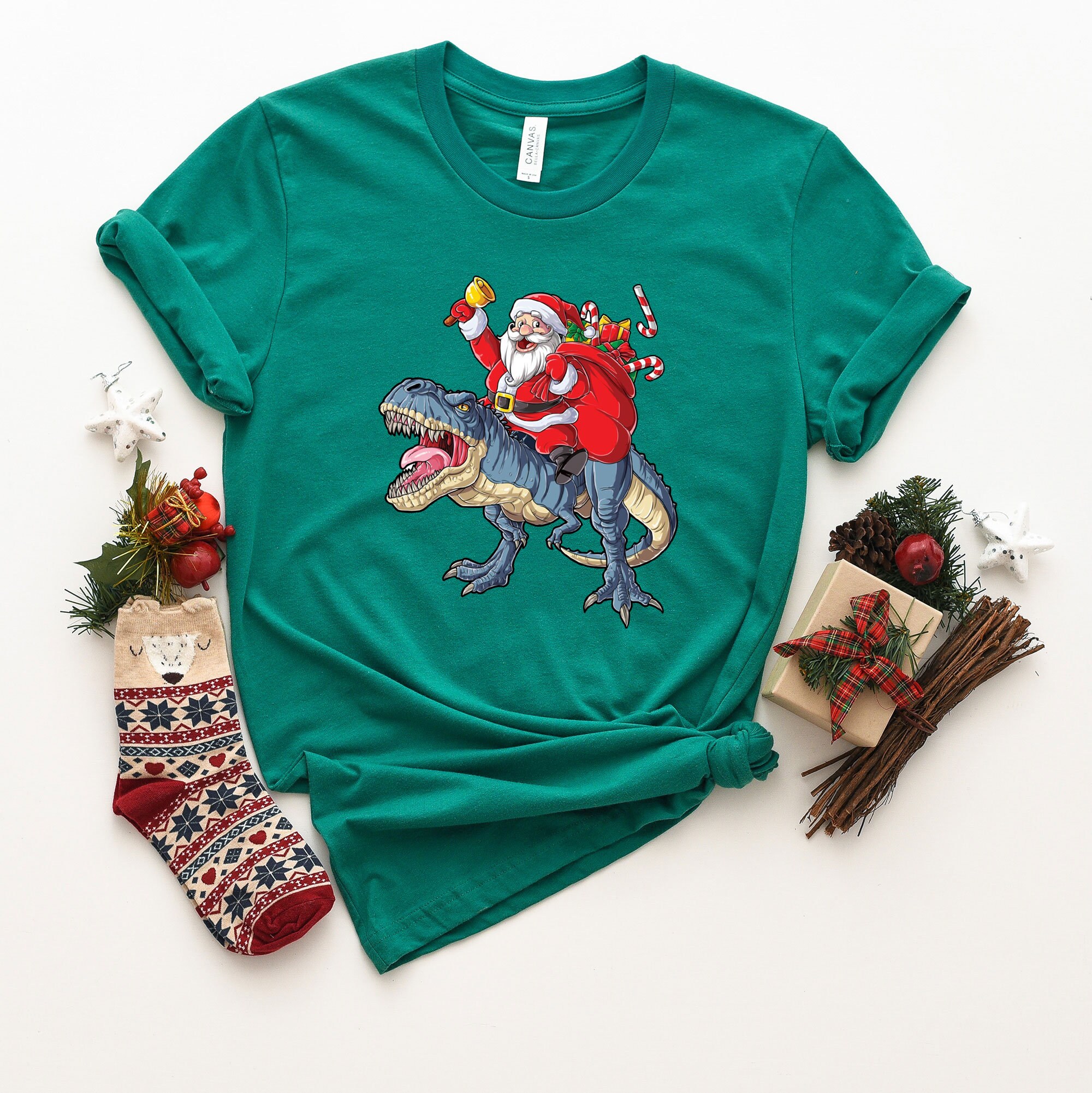 Discover Santa Claus Riding Dinosaur Shirt - Christmas T-rex Tee - Dino Lover Gift T-shirt - Funny Xmas Boy Shirt - Holiday Party T-shirt