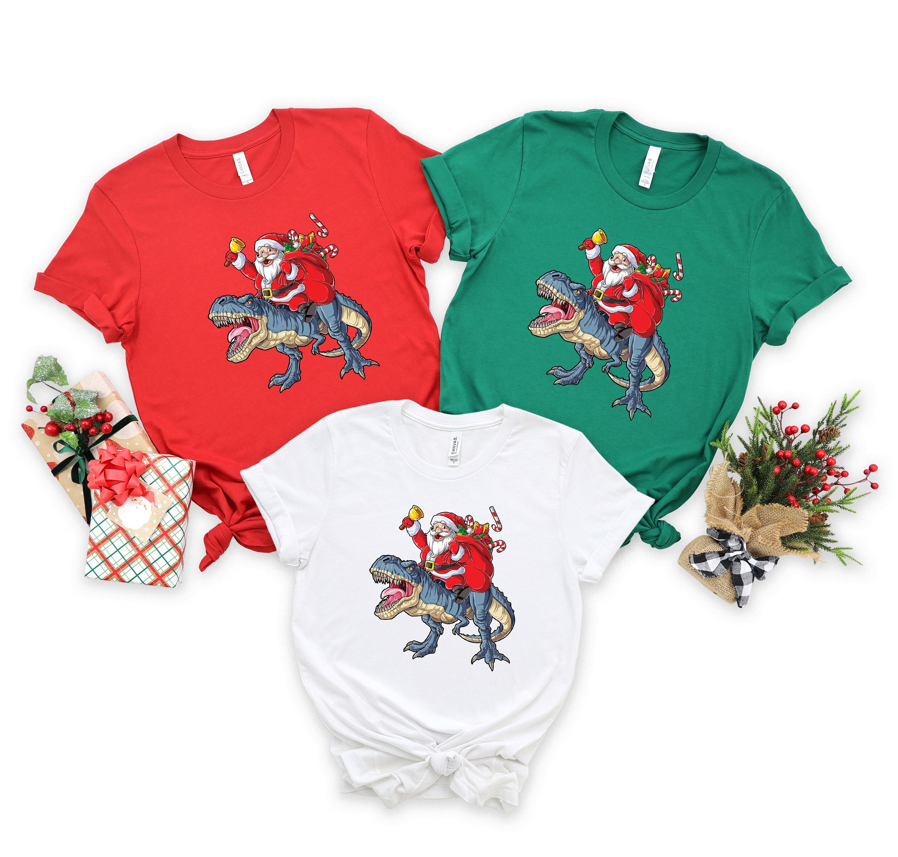 Discover Santa Claus Riding Dinosaur Shirt - Christmas T-rex Tee - Dino Lover Gift T-shirt - Funny Xmas Boy Shirt - Holiday Party T-shirt