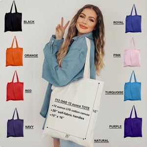 May include: A set of 12-ounce tote bags in various colors, including black, royal blue, orange, red, navy, pink, turquoise, and purple. The bags are made of 12-ounce LYD cotton canvas with 20-inch self-fabric handles. The bags measure 15 inches by 16 inches. The text "113 OAD 12 ounce TOTE" is printed on the white bag.