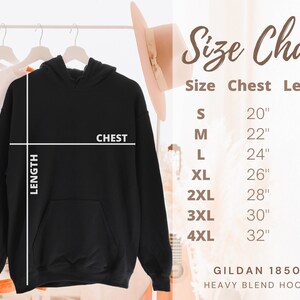 May include: Size chart for a black hooded sweatshirt with a pocket. The chart shows chest and length measurements in inches for sizes S through 4XL. The text "GILDAN 18500 HEAVY BLEND HOODIE" is at the bottom of the chart.