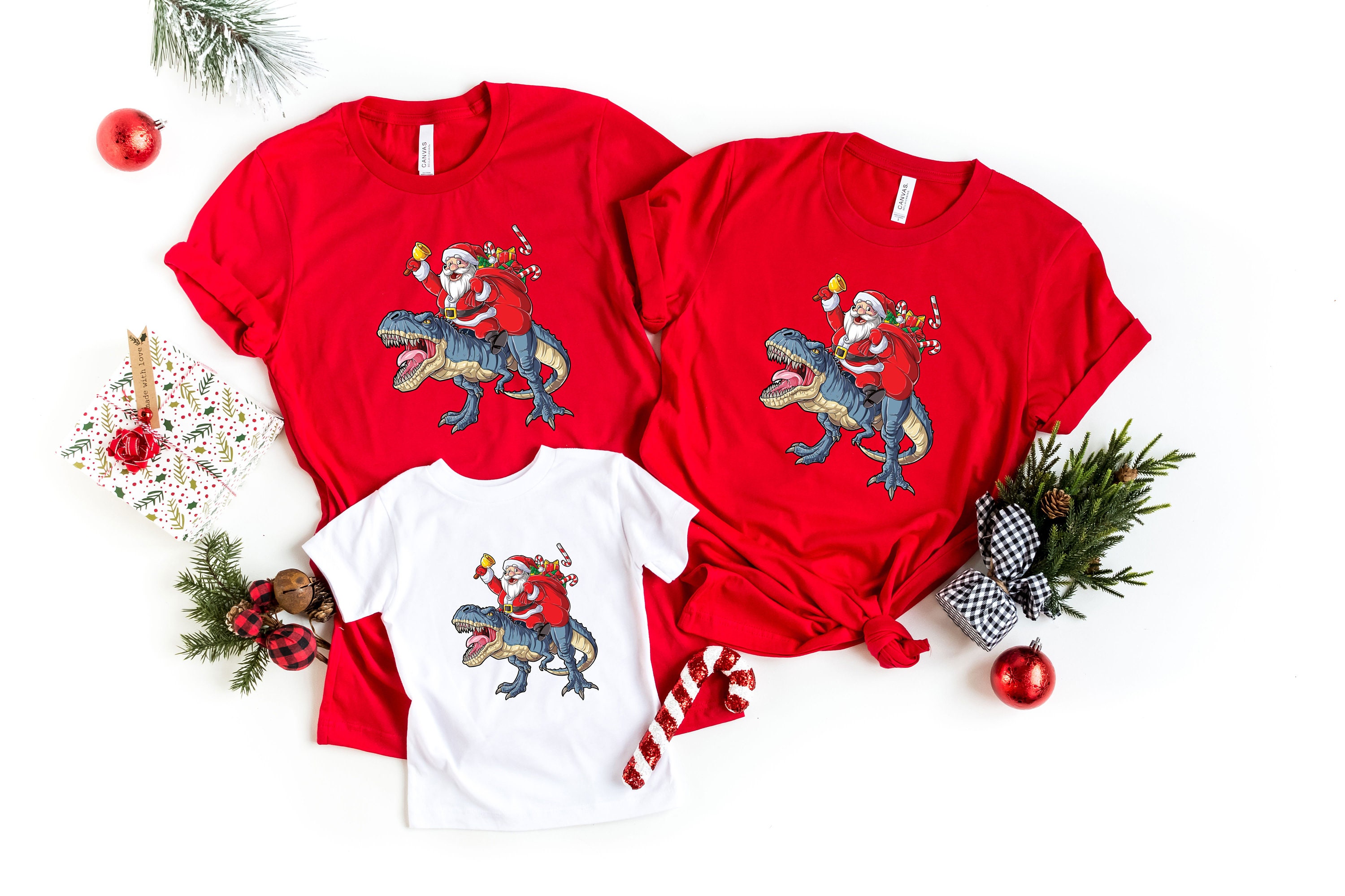 Discover Santa Claus Riding Dinosaur Shirt - Christmas T-rex Tee - Dino Lover Gift T-shirt - Funny Xmas Boy Shirt - Holiday Party T-shirt