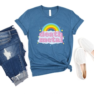 May include: A blue t-shirt with a rainbow and the words "death metal" in pink letters.